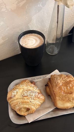 croissant w/ ham and cheese (delicious) and pain au chocolat, hot chocolate   at The Sanctuary in Berlin