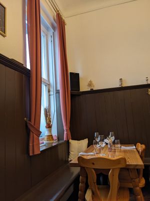 Classic rustic tavern interior design at Schlicht Vegan in Vienna