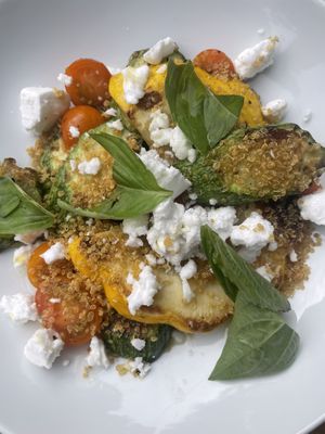 Roasted squash and tomato plate with coconut feta  at Finch & Pine in Seattle