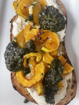 Fall harvest tartine with cashew ricotta and basil pesto  at Finch & Pine in Seattle