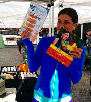 Founder & chief co-operator Kristina Carillo-Bucaram with her newly published book, The Fully Raw Diet, and VegNews in which she contributed an article, 10 Things I Do To Stay Healthy. at Rawfully Organic Co-op in Houston