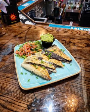 Vegan Quesadilla with Frijoles Refritos and Guacamole at Papi's Tacos in Ocean City