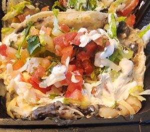 Not sure what this creamy white stuff is...? at Papi's Tacos in Ocean City