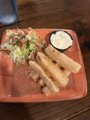 VEGAN YUCA FRITA
Crispy yuca root served garnished with shredded lettuce and pico de gallo $9  at Papi's Tacos in Ocean City