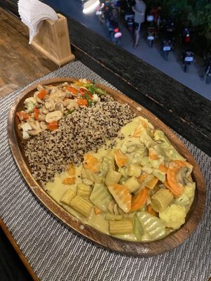 “Double Trouble” 320 Pesos. Half vegetable curry, half tofu sisig (substituted for mushrooms as they had ran out) and quinoa.   at Hungry Monkeys in Cebu