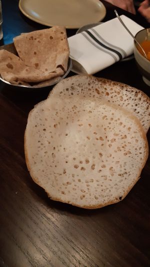 Side dishes: Appam (closest) and Chapati (further away) at Bhoomi Kitchen in Headington