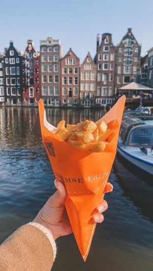 Eat your fries with a view over the Canals at Vlaamse Frites Snackland in Amsterdam