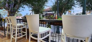 Outdoor seating in a pleasant central location at Roni Maadanei Boutique - VBurger - Roni's Hummus - La Plata Mia in Zikhron Yaakov