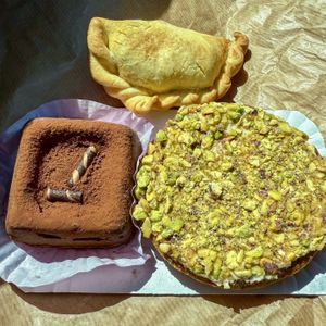 Soy chunk empanada, sweet potato brownie, carrot cake   at Espai Food Lovers in Mallorca