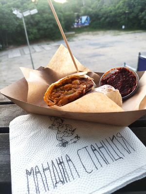 Vegan bean burrito with hot sauce at Mangia Station in Sofia