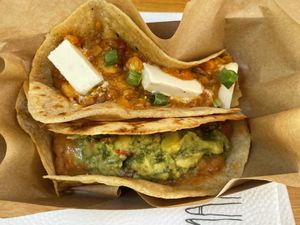 Taco de guisado (top, 5.49 lev) and taco de frijoles (4.99 lev). Note a 10% discount for buying 2 tacos, or 15% for buying 3. So these cost 9.43 lev total.  at Mangia Station in Sofia