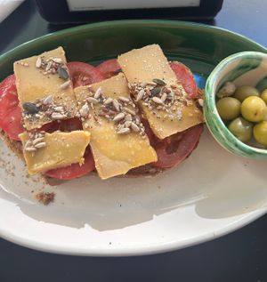 Vegan cheese and tomato’s toastada!! Really good   at La Cabra Feliz Bar Etico in Mallorca