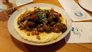 Ginger hummus with sauteed mushrooms with herbs. at Creativa in Ingolstadt