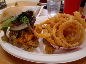 Jalapeno burger with onion rings at Bean Vegan Cuisine in Charlotte