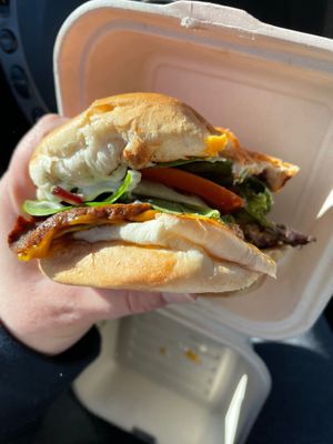 Bacon chzburger with seitan bacon, lettuce, tomato, cheese, impossible patty and onion  at Bean Vegan Cuisine in Charlotte