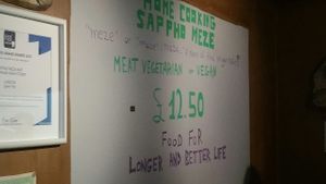 Signage at Sappho Meze in South West London