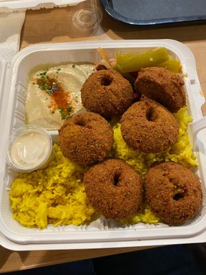 Falafel, turmeric rice, hummus, cabbage salad, and tahini cup at Falafel Kitchen - Food Stall in Dublin