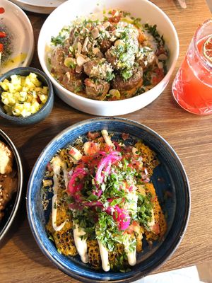 Crispy potatoes, pineapple salsa, elote  at Cú in Belfast