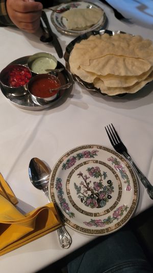Papadums, the chutney and onion dips are vegan at Bengal Village in East London