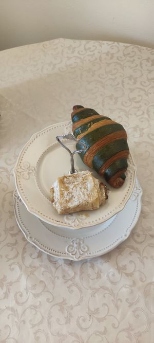 Pastry with apples and raisins plus brioche filled with figs at Pasticceria Flego in Verona