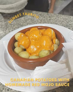 Papas arrugadas / Canarian potatoes with red mojo sauce (vegan) at Sunset Taurito Restaurant & Cocktail Bar in Gran Canaria