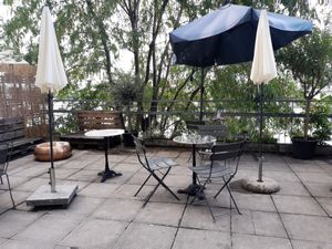 Seating on terrace at Bioladen Eichblatt in Basel
