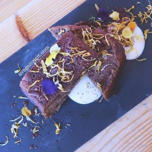 Walnut and date banana bread with almond vanilla custard at Wild Food Cafe in London