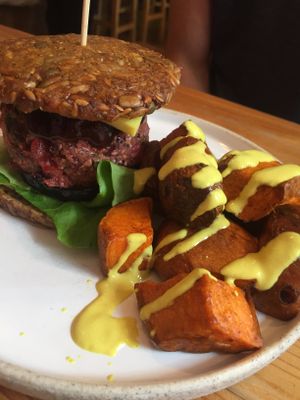 AMAZING raw burger and bun with sweet potatoes cubes  at Wild Food Cafe in London