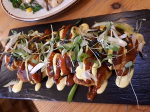 Cauli-wings with spring onions and curry sauce  - a real treat   at Wild Food Cafe in London