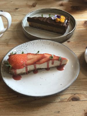 Strawberry and cream tart and white chocolate slice  at Wild Food Cafe in London