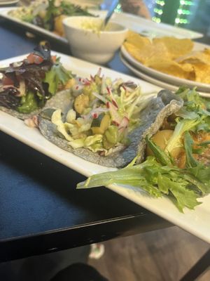 Three of their tacos. The deep fried avocado, pozole, and potato    at The Adelitas Mexican Restaurant in Chicago