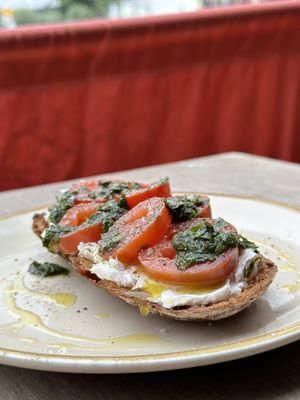Confit Tomatoes, Jullienne Bruno superstraccia, gremolata on toast  at Photo Book Café in London