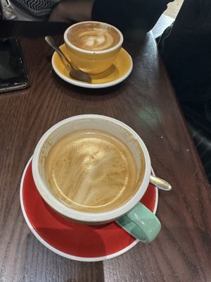 Luke warm but nice coffee   at Photo Book Café in London