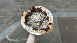 Banana, hazelnut, chocolate base — pizza Fridays   at Photo Book Café in London