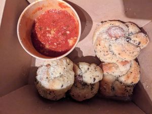 Garlic knots (we couldn't wait and ate one before the pic) at Squatcho's in Rochester