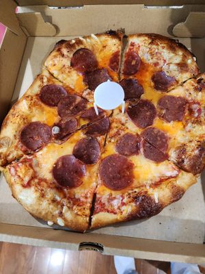 Pepperoni pizza with grass fed pepperoni at Squatcho's in Rochester