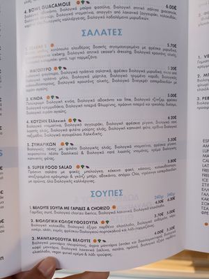 Vegan is with purple sign, no english menu at Kouzēn in Thessaloniki