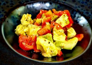 Avocado and Tomato Salad with Poppy Seeds, Sesame Seeds, Garlic, Salt & Pepper, Olive Oil. Vegan at Habitat Bar & Veg Restaurant in Koh Lanta