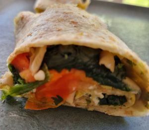 Breakfast Burrito with homemade Pesto, Wild Mushrooms, Spinach, and Parmesan. at Habitat Bar & Veg Restaurant in Koh Lanta