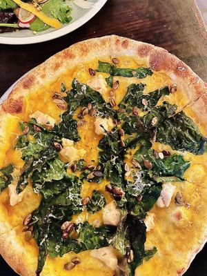 The World is a Vampire Pizza: Kabocha squash purée, goat cheese, black kale, candied pumpkin seeds, truffle oil ✨Delicious   at Donna Jean - Sherman Oaks in Sherman Oaks