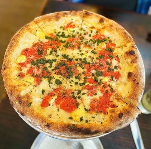 Four Horsemen pizza: Hard and soft mozzarella, ricotta, parmesan, crushed tomato, pesto, oregano✨delicious   at Donna Jean - Sherman Oaks in Sherman Oaks