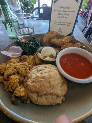 motherlode breakfast: tofu scram, biscuit, potatoes, greens, absolute fire 10/10 at Donna Jean - Sherman Oaks in Sherman Oaks