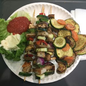 Skewers with tofu and seitan with side of grilled vegetables.  at Green Point in Zagreb