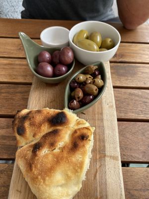 Starter of olive and bread (very accommodating, they made it vegan for us)  at Pizzeria Piccola in Ljubljana