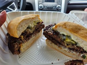 Impossible Smush Burger: two Impossible patties, fried onion, pickle, tofu crema.  at Lua Brewing in Des Moines