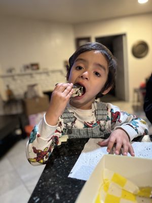 Enjoying the treats   at Cosmic Bakery  in Upland