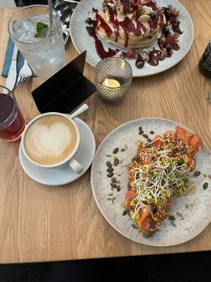 cappuccino with oat milk, vegan pancakes, and avocado bread deluxe with vegan salmon   at Emmi's Kitchen - Schwabing in Munich