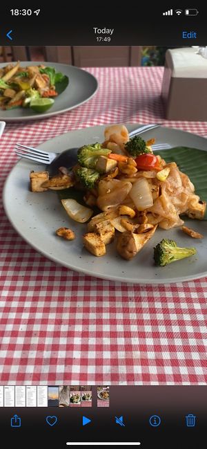 Fried rice noodles with cashew sauce and veggies  at Spring Rolls Lanta in Koh Lanta