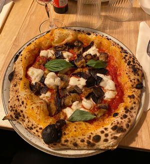 Vegan margherita with extra aubergine  at Basils in Brussels