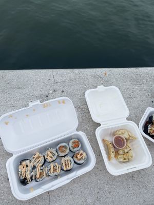 Middle dish is vegetarian (vegetable gyoza) and it was delicious!  at Rollbotto Sushi in St Petersburg